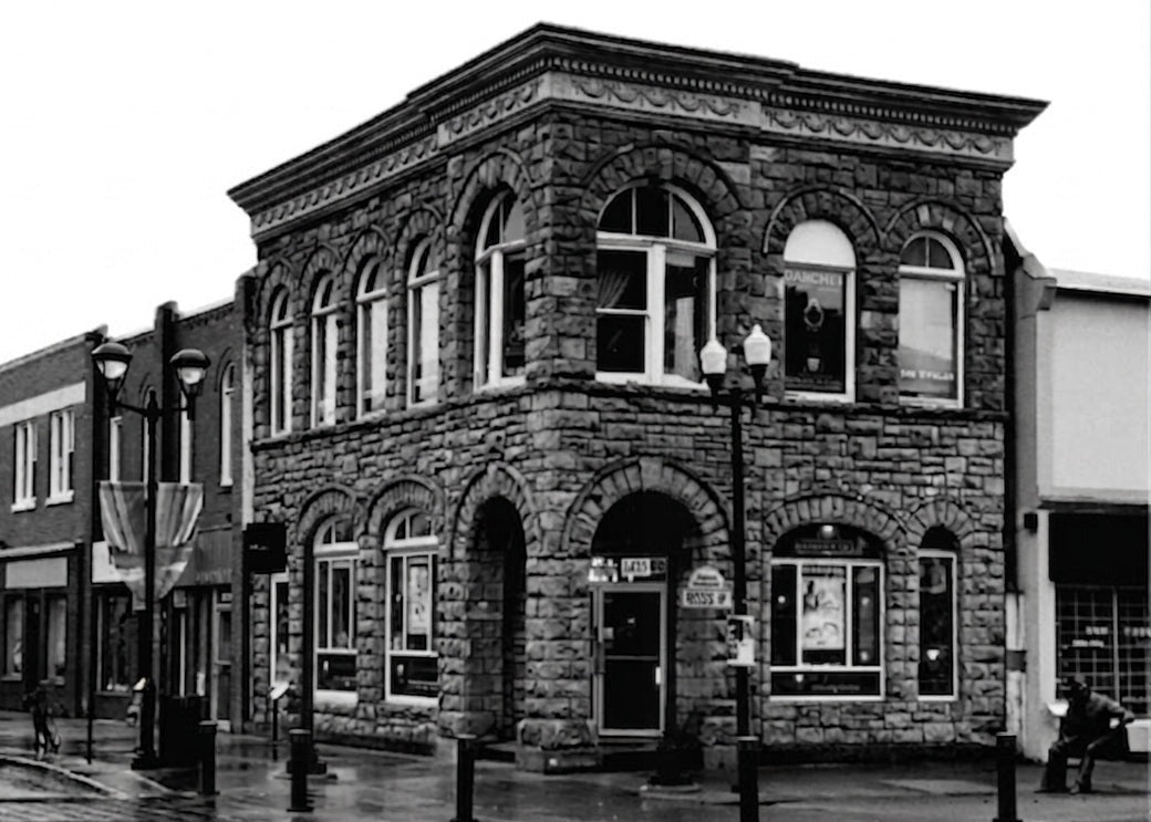 Image showing the outside of the historic sandstone building in downtown Red Deer where Artistry in Gold is located