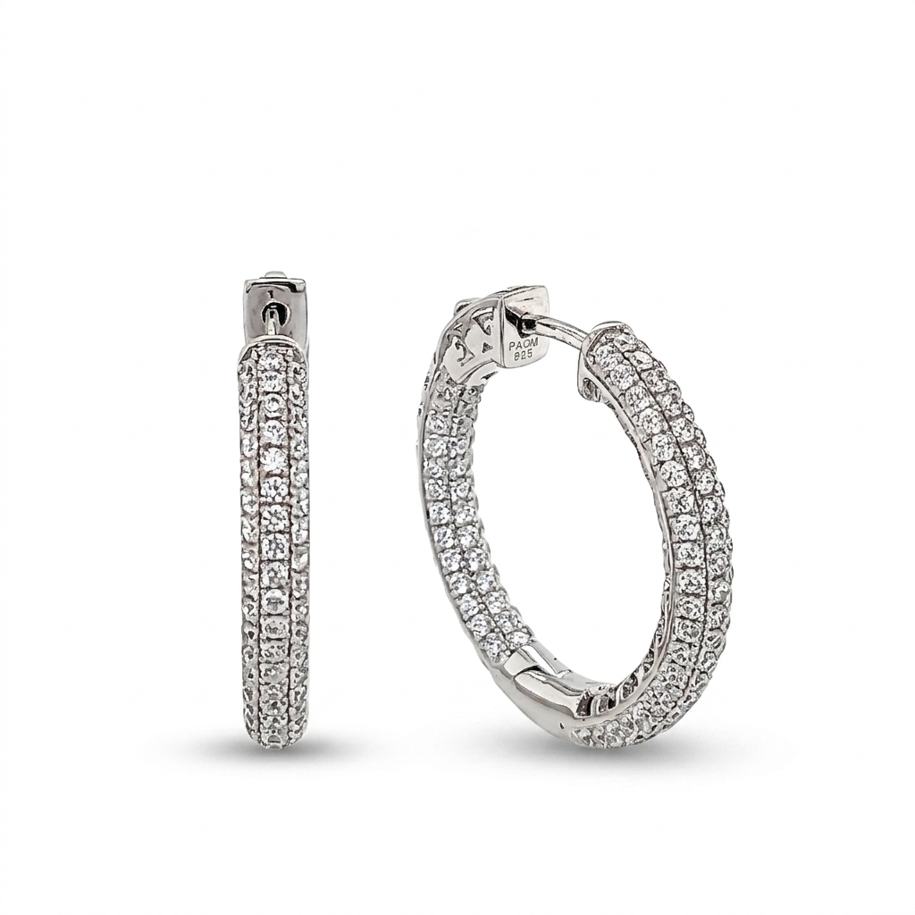 Sterling Silver Inside Out Hoop Earrings set with 3 rows of round cut cubic zirconia