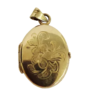 Gold locket with floral design on a white background