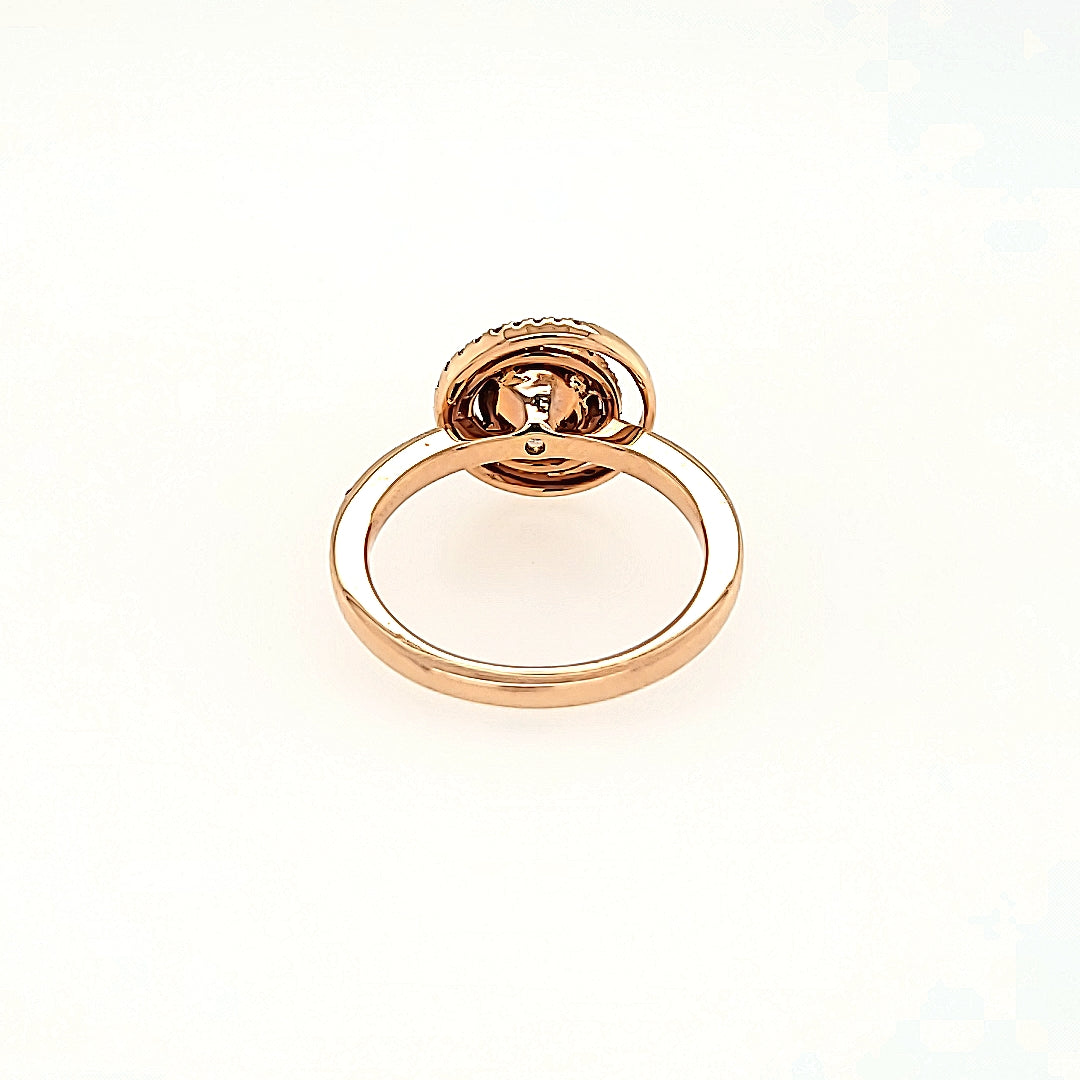 Eclipse Inspired Morganite Halo Ring with Diamonds in 14k Gold