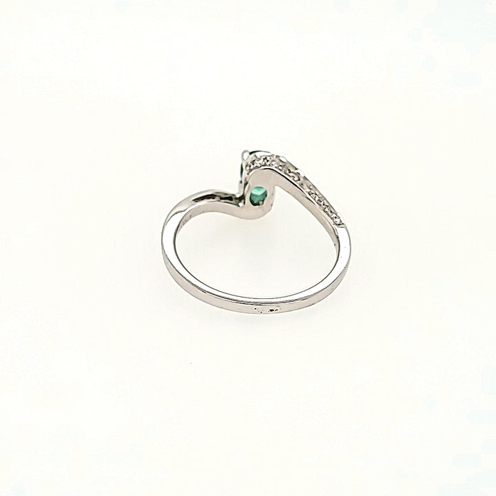 Bypass Style Emerald Ring with Diamonds in 14k Gold