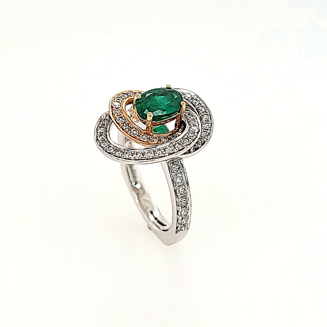 Swirling Emerald and Diamond Halo Ring in 18k Gold