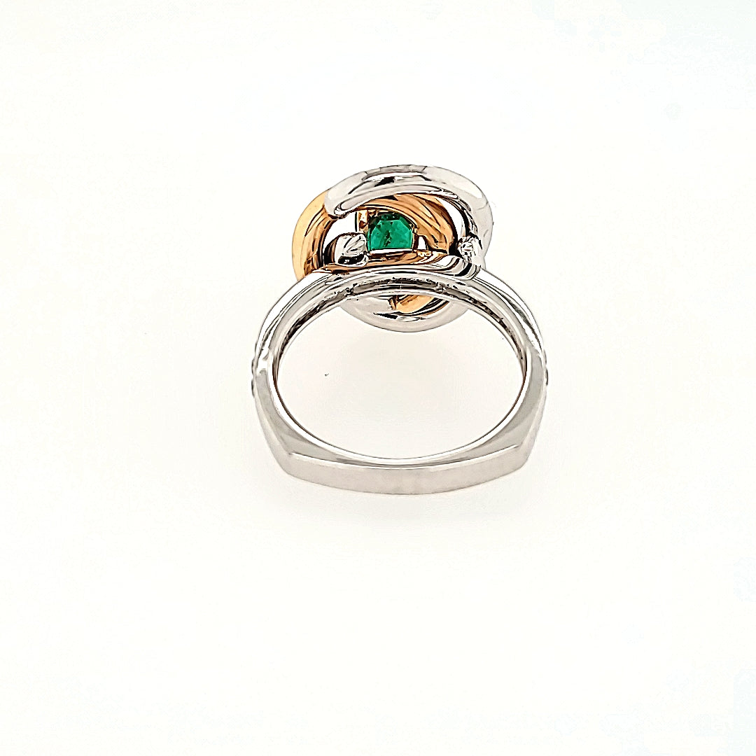 Swirling Emerald and Diamond Halo Ring in 18k Gold