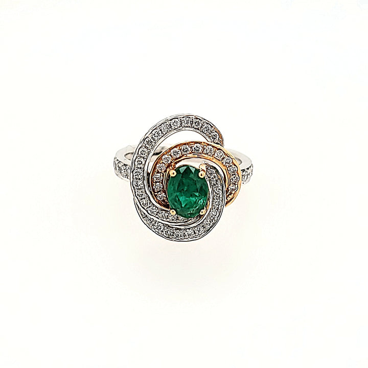 Swirling Emerald and Diamond Halo Ring in 18k Gold