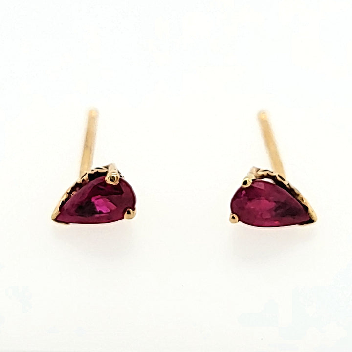 Pear Cut Ruby Studs in 14k Gold