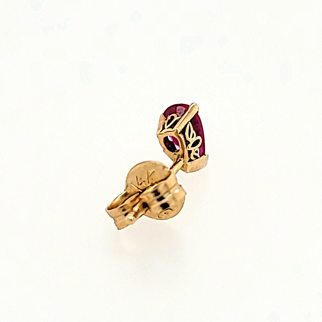 Pear Cut Ruby Studs in 14k Gold
