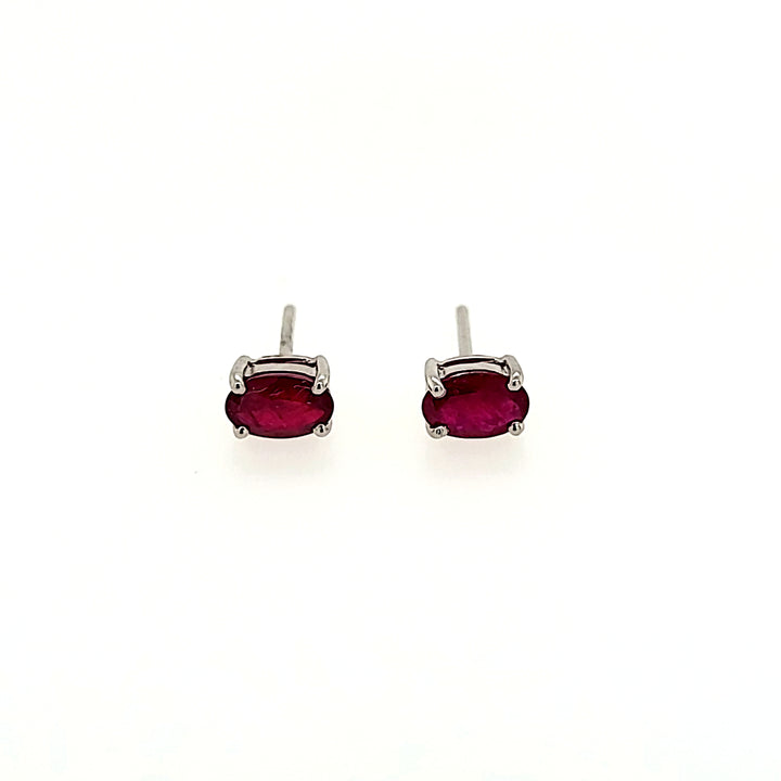 Oval Cut Ruby Studs in 14k Gold