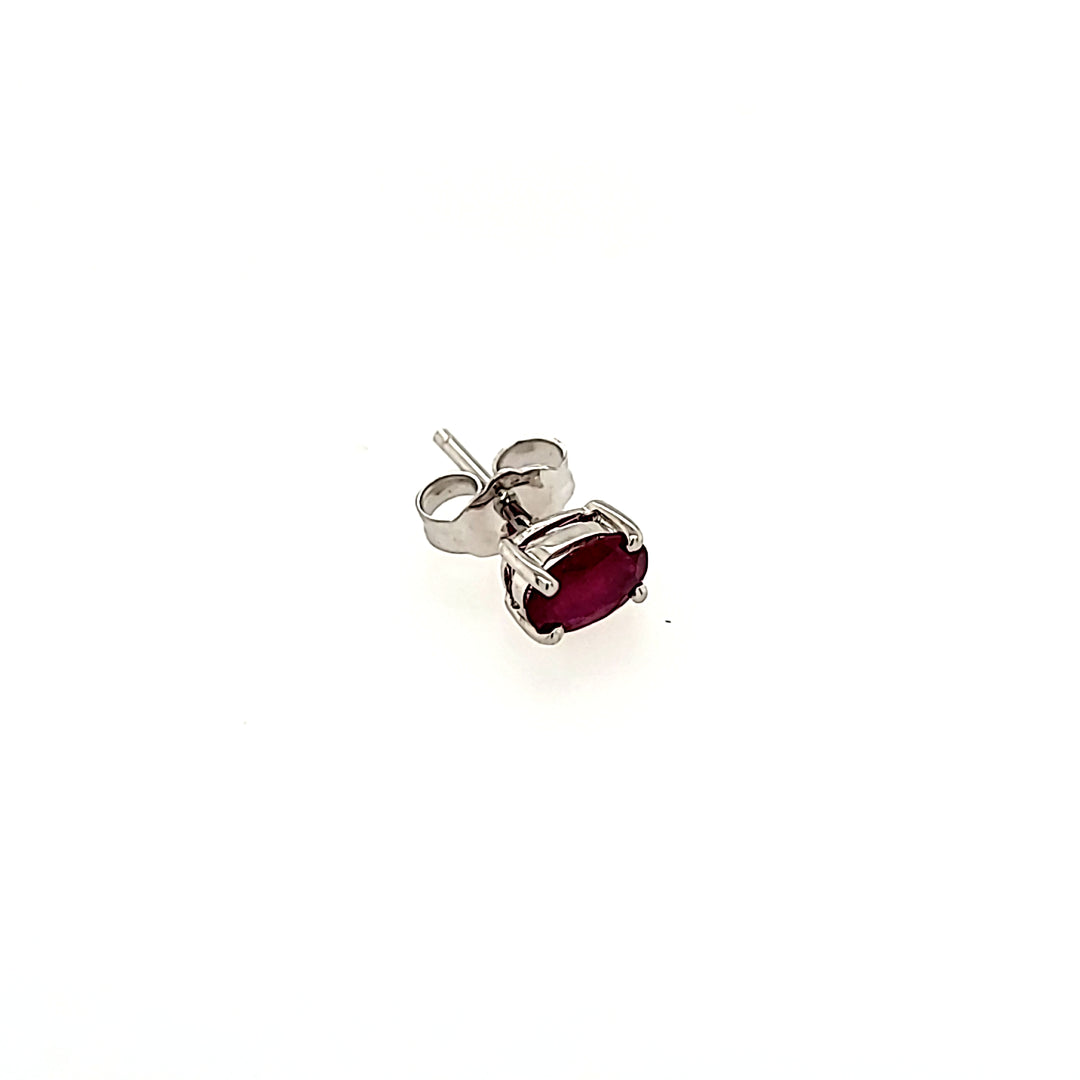 Oval Cut Ruby Studs in 14k Gold