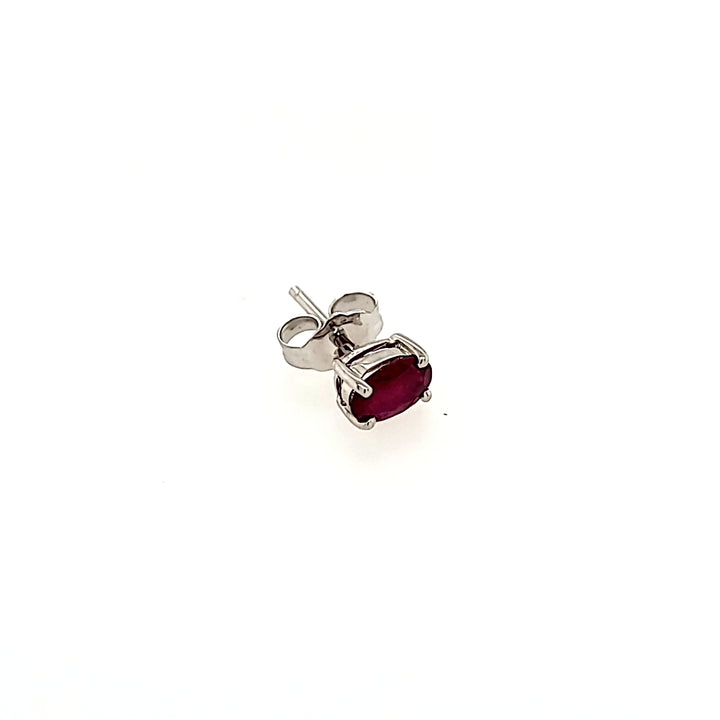 Oval Cut Ruby Studs in 14k Gold