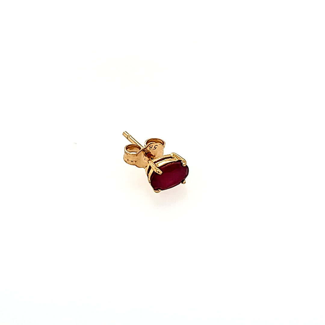 Oval Cut Ruby Studs in 14k Gold