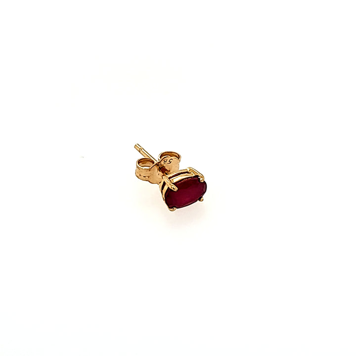 Oval Cut Ruby Studs in 14k Gold