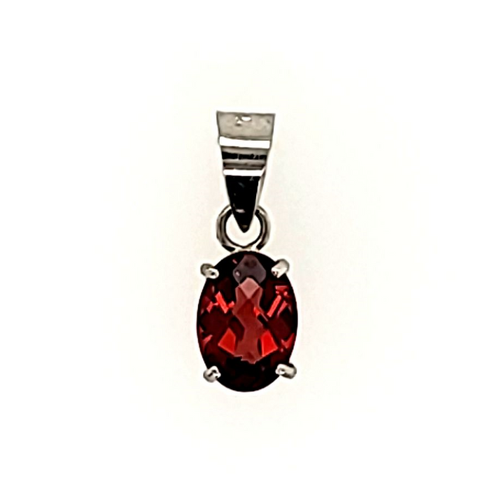 Oval Cut Garnet Pendant in  Gold