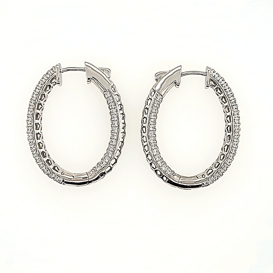 Oval Hoop Earrings with Cubic Zirconia in Sterling Silver